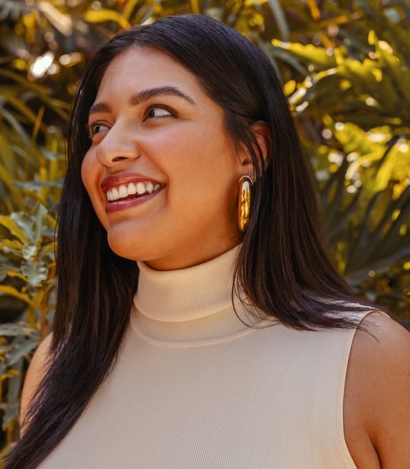 Woman with healthy looking and naturally straight black hair