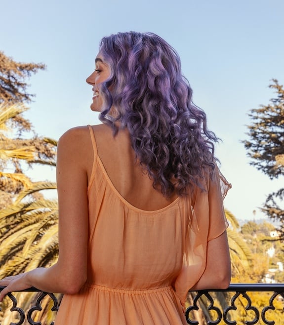 Woman with purple hair dye