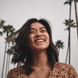 Woman with healthy looking and naturally straight black hair