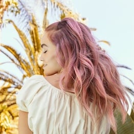 Woman with pink hair color